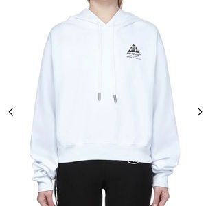 Off-white hoodie with design on back